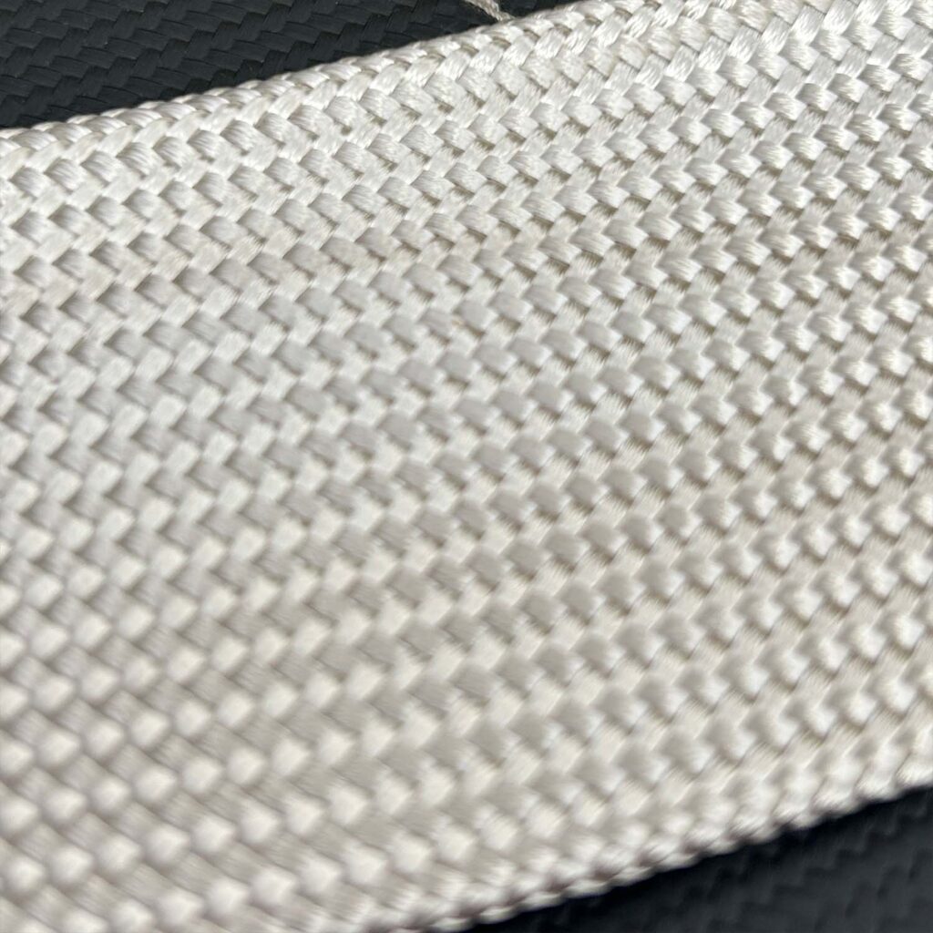 hose sleeve fiberglass heat shield close up
