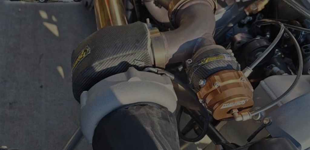black wastegate shield on car