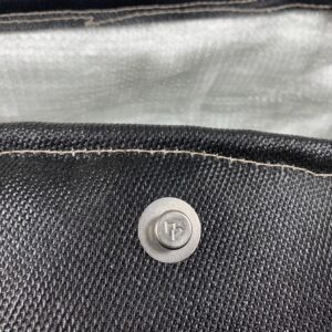 button head rivet on black exhaust jacket