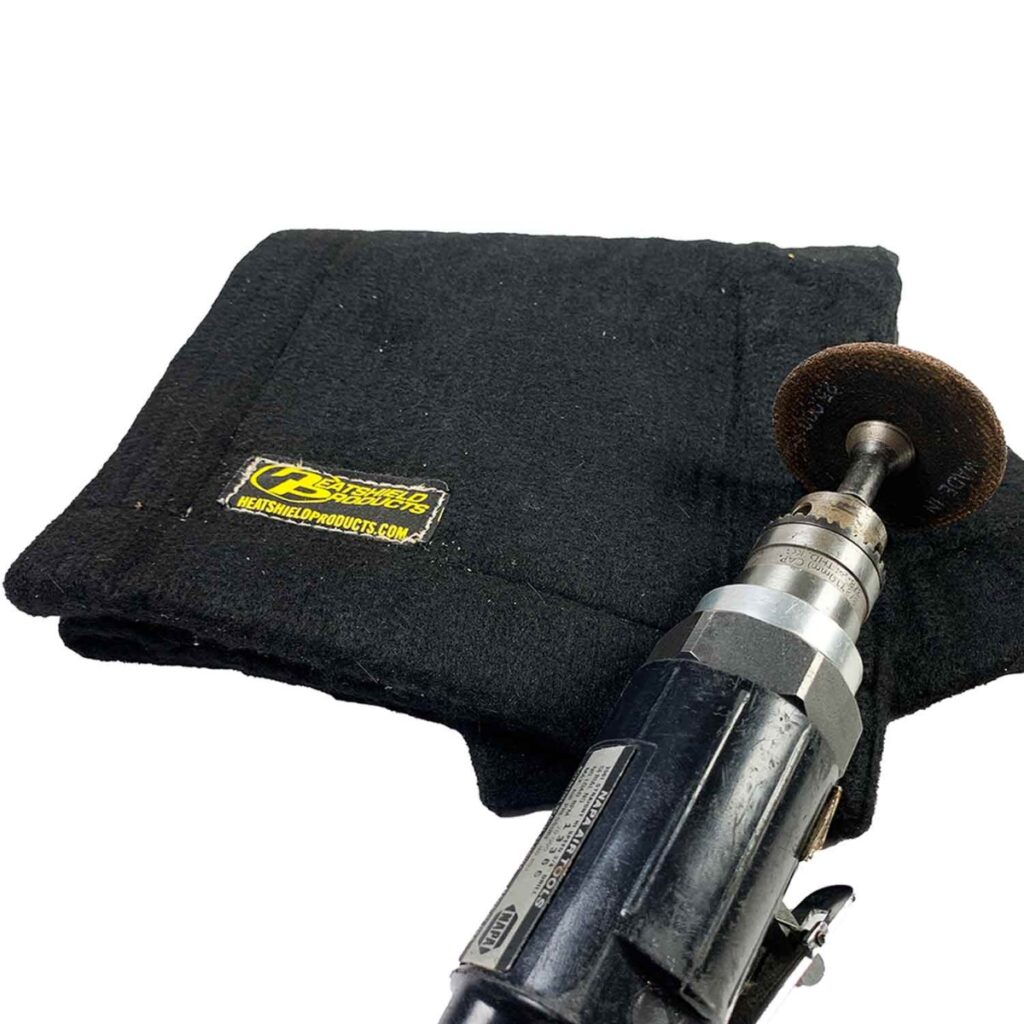 black safety blanket for sparks with grinder