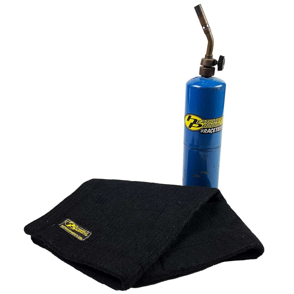 torch with black welding safety blanket