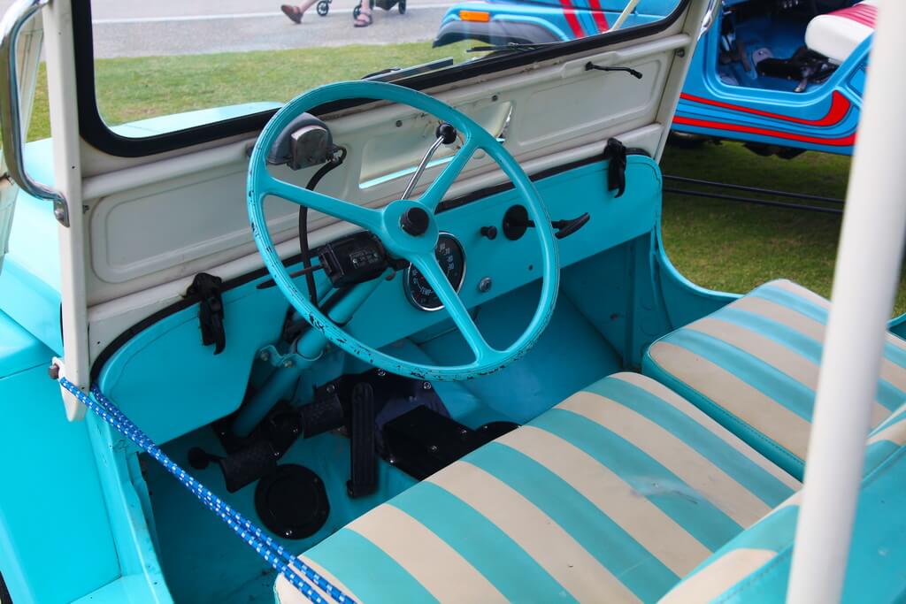 Inside View of Passenger Cabin of Baby Blue Vintage Jeep