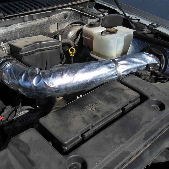 Heatshield Products cold air intake CIS Kit installed on a Ford F250 truck
