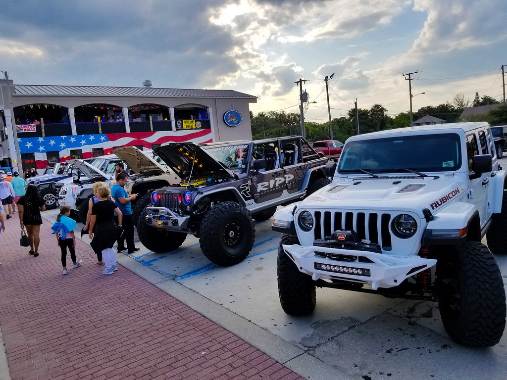 Colorful Jeeps Parked in a Shop Parking Lot