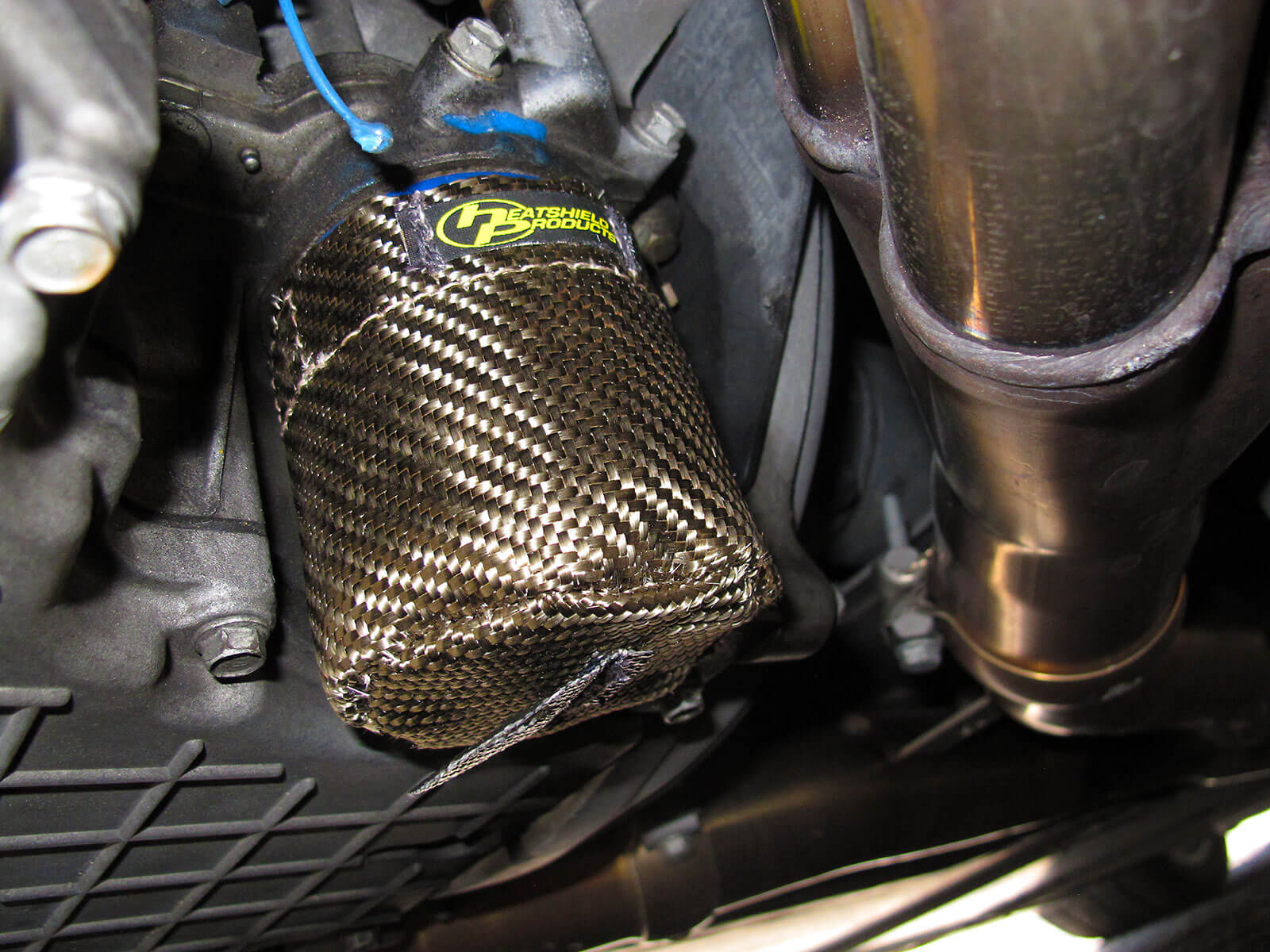 Gold Heat Shield Insulation Installed on Car Under Carriage