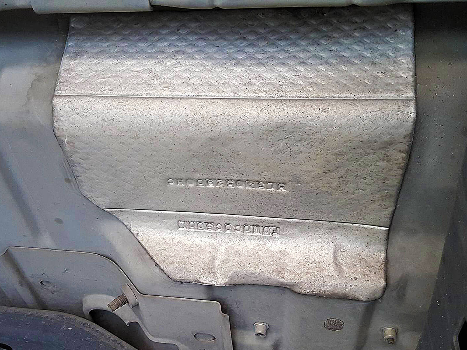 Heat Shield Barrier Mounted on Engine