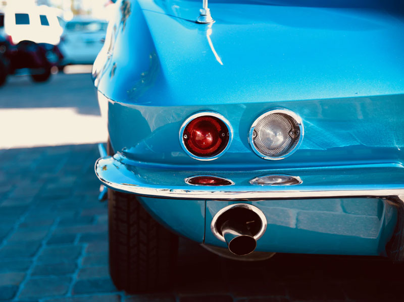 Trunk of a bright blue sports car