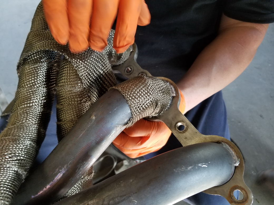 Installing exhaust wrap on a set of exhaust headers