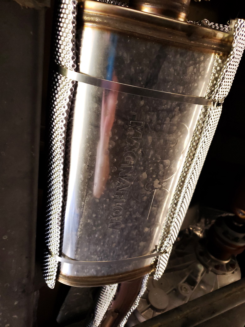 Heatshield Products Muffler Armor installed on a 2016 Jeep Wrangler JK muffler