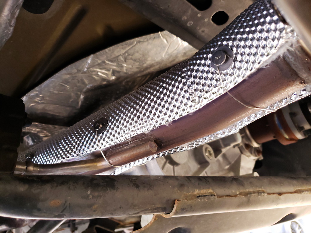 Pipe Armor exhaust insulation kit installed on a 2016 Jeep Wrangler