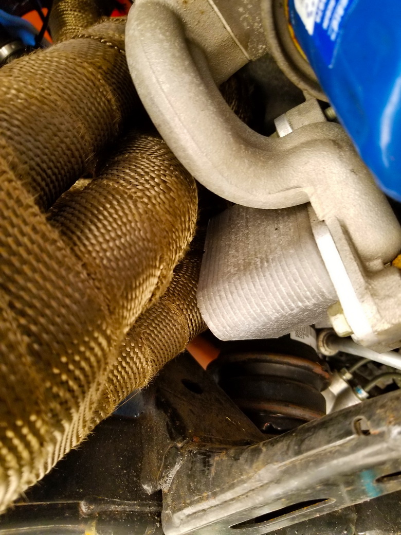 Exhaust header running past oil cooler on 2010 LS3