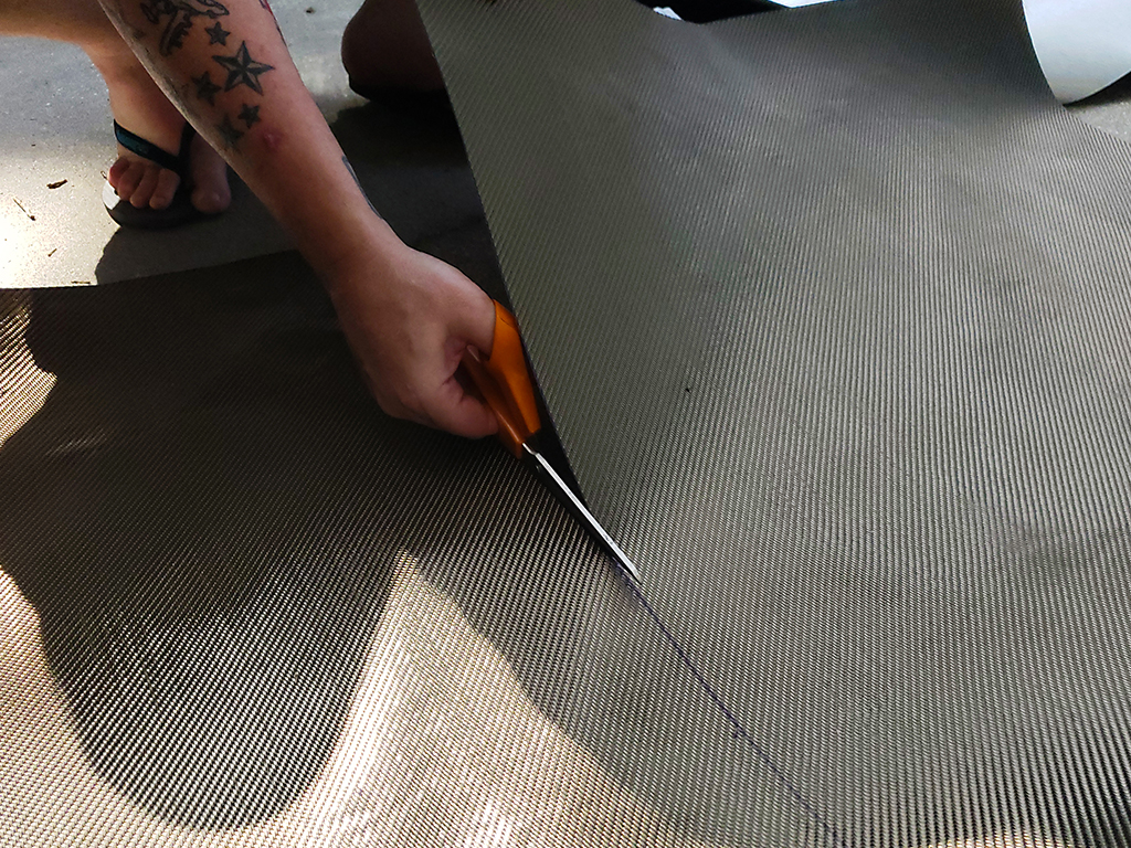 Cutting Lava Shield with scissors