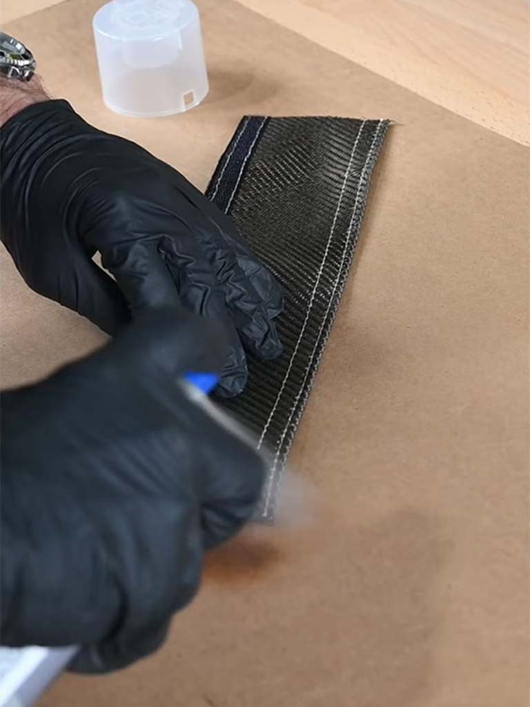 Spraying high-temp clear engine enamel on the cut end of Lava Tube to prevent fraying