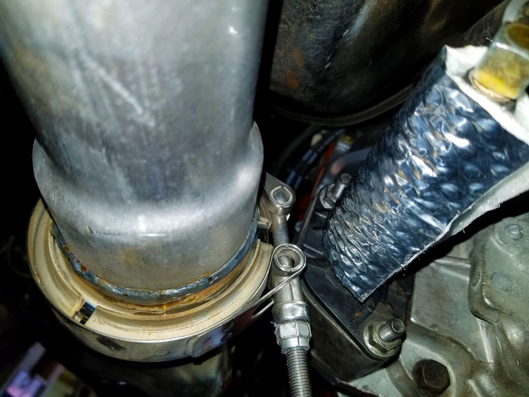 T56 Six Speed Clutch Slave Cylinder Wrapped with Heatshield Products Sticky Shield