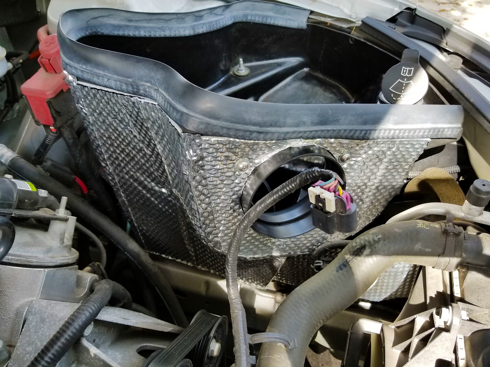 Cold Air Intake Heat Shield Applied to Car Engine.