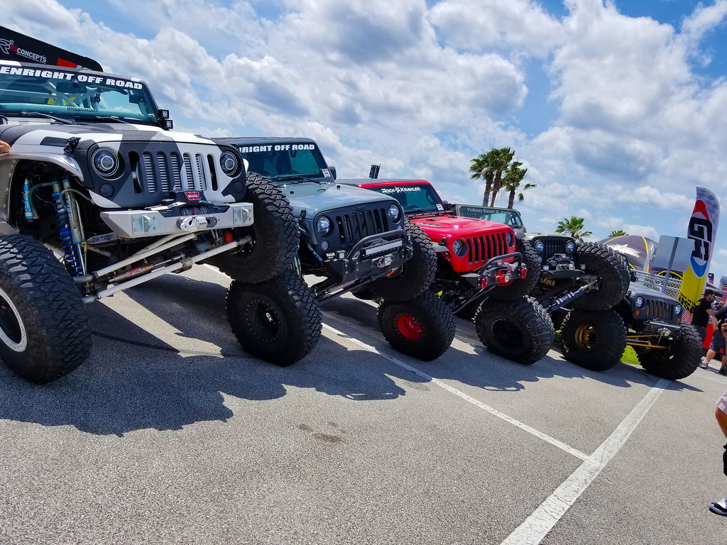 Line of Jeeps Tilted on One Another 