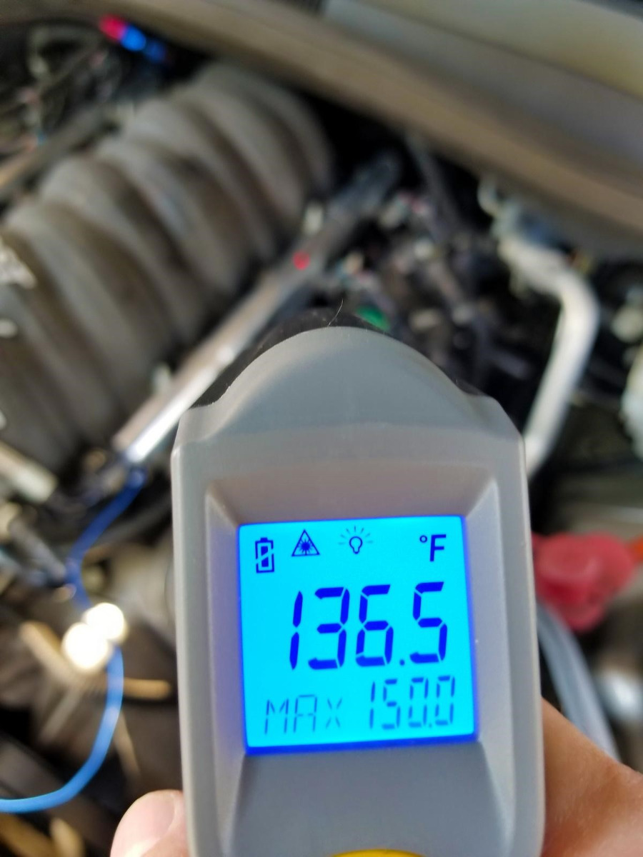 A digital thermometer reads 136.5 F