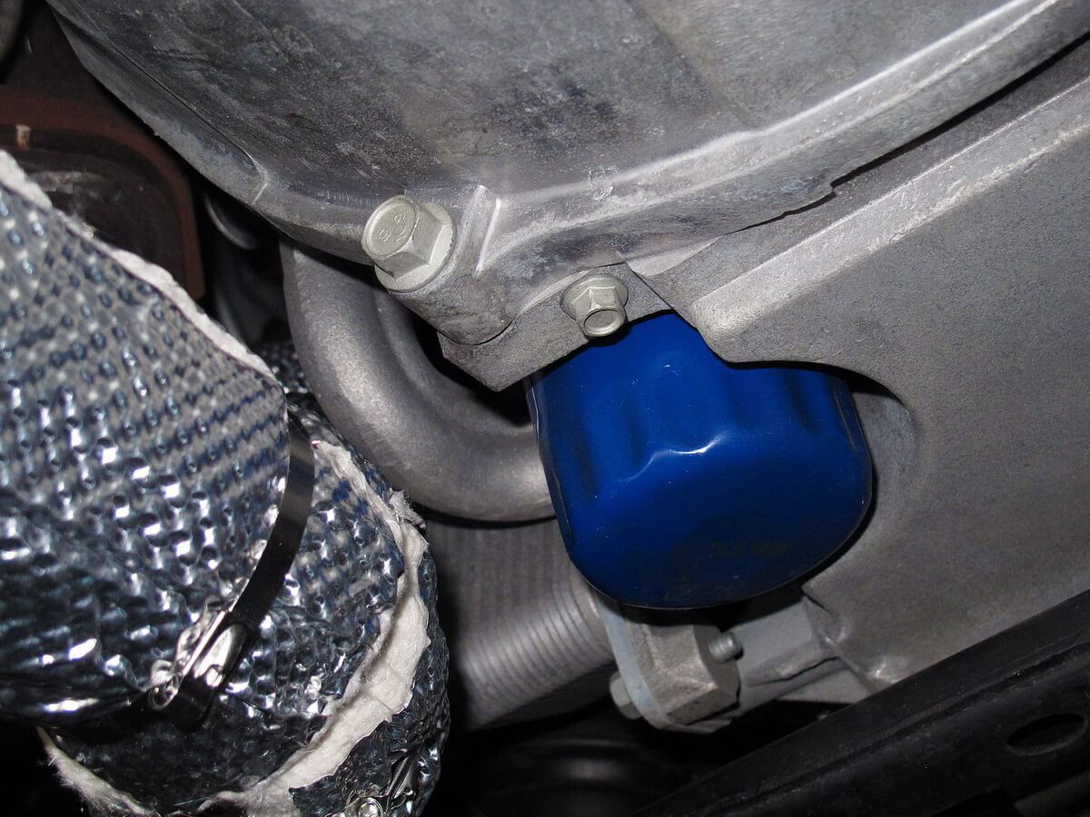 Close Up of Car Engine with Heat Wrap Insulation Installed