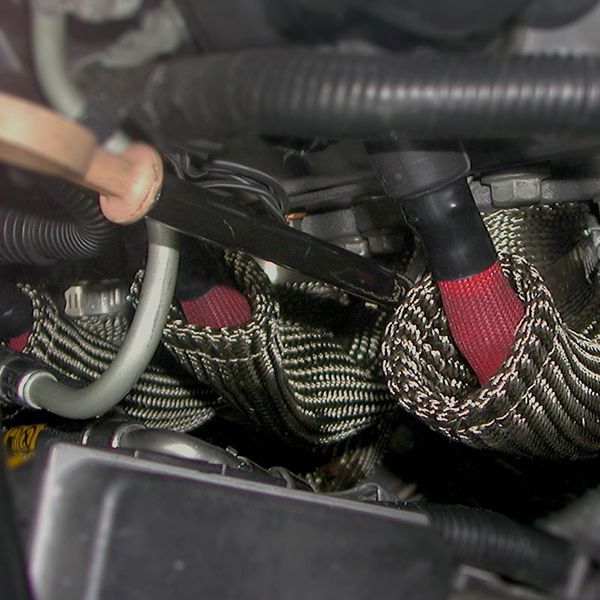 Basalt heat shield spark plug boot