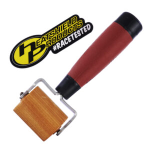 Professional-grade installation roller tool with red anti-slip handle and maple roller