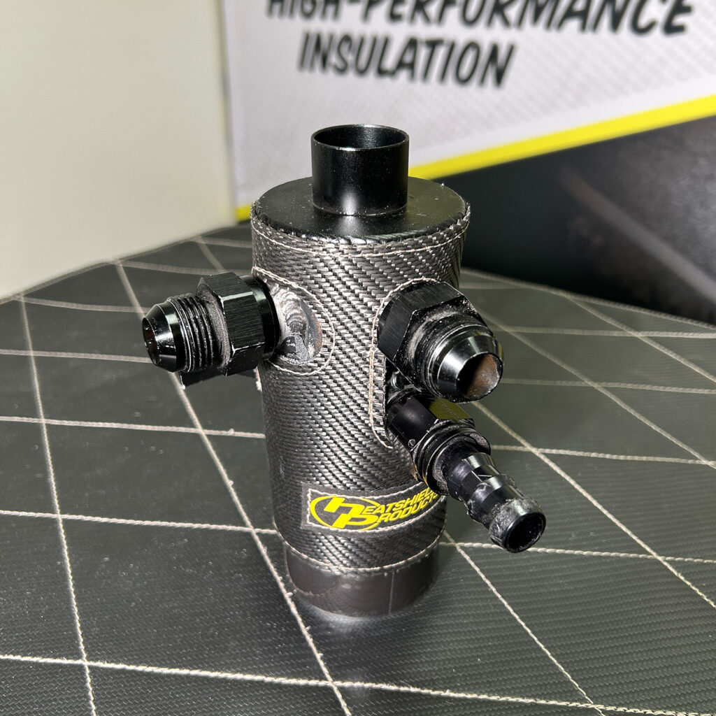 Custom oil catch can wrapped in Heatshield Products thermal insulation for maximum heat protection and durability.