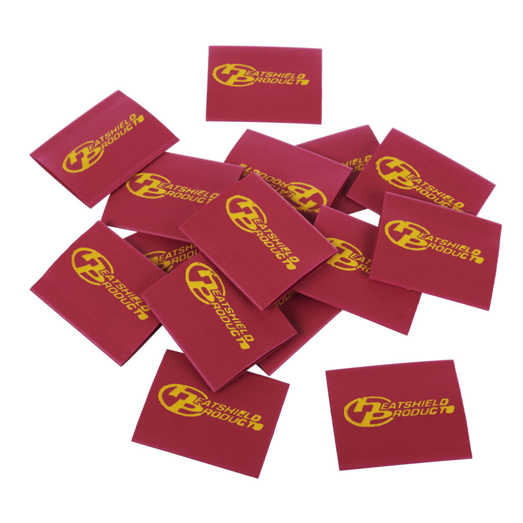 Red Heatshield Products heat shrink tubing set with yellow logo, designed for automotive wire protection and clean installs