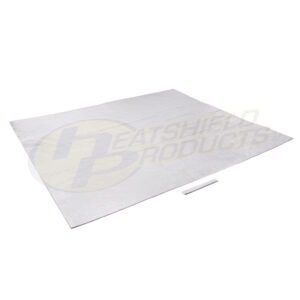 A large, rectangular silver heat shield mat is laid flat on a white background with a small white strip placed near the bottom edge.